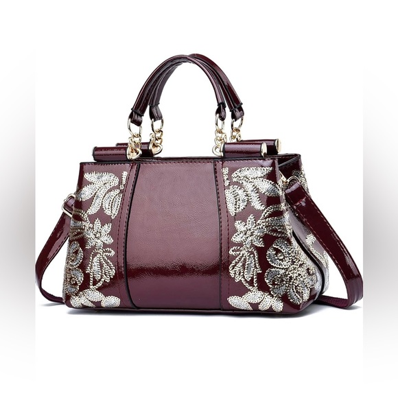 nevenka Handbags - Sold Nevenka patent handbag NEW